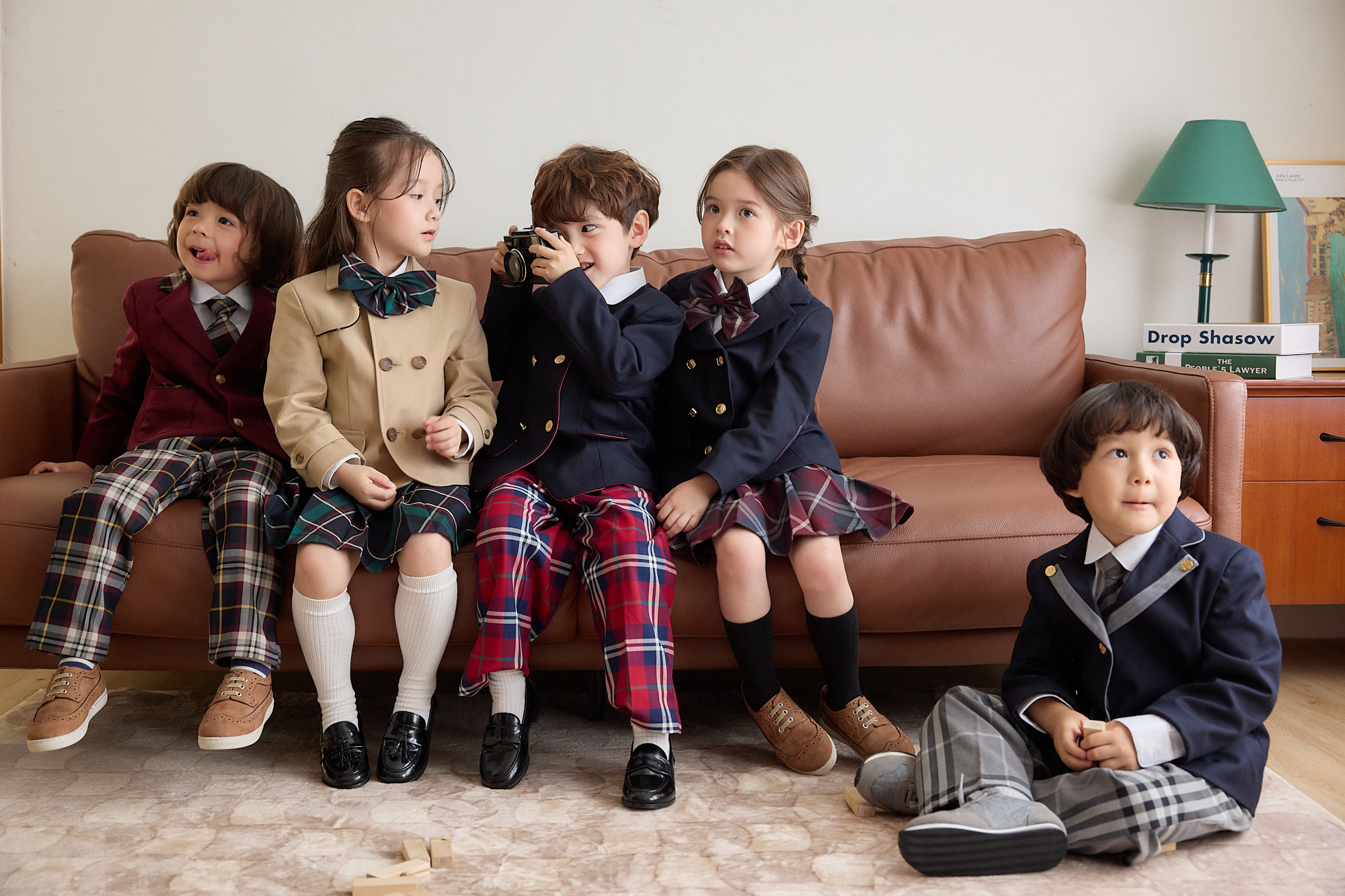 Children wearing THE YOOA premium kindergarten uniforms